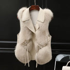 Faux fur vest with collared design in beige, showing plush textured front panels and elegant detailing for a premium winter style