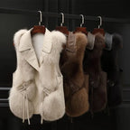 Faux fur vest with collared design shown in multiple colors on hangers, highlighting variety and premium plush texture for shoppers