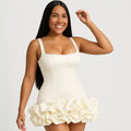 ruffle hem dress in crisp white showcasing joyful expression, perfect square neckline and luxurious gathered fabric bottom detail