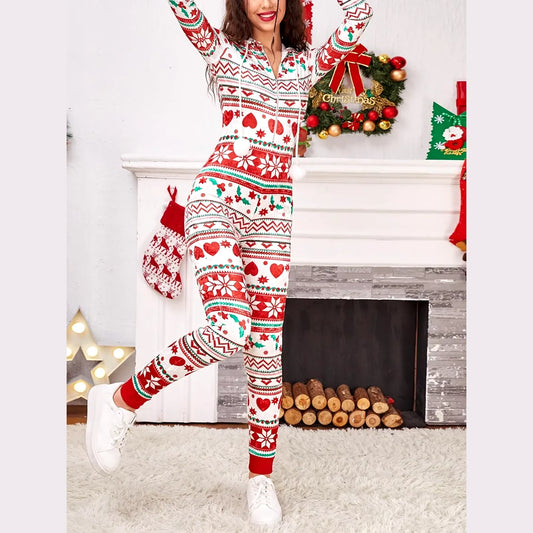 Festive Christmas onesie with red and green patterns, featuring hearts and snowflakes. Cozy holiday loungewear.