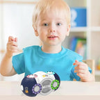 Toddler playing with a fidget toy on table, enhancing hand coordination and motor skills.
