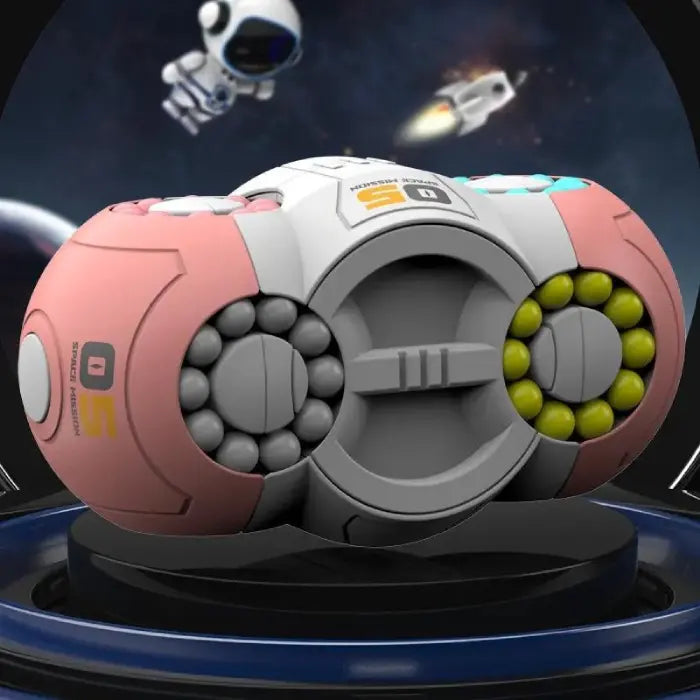 Fidget toy with colorful beads and space-themed background showing astronaut and rocket.