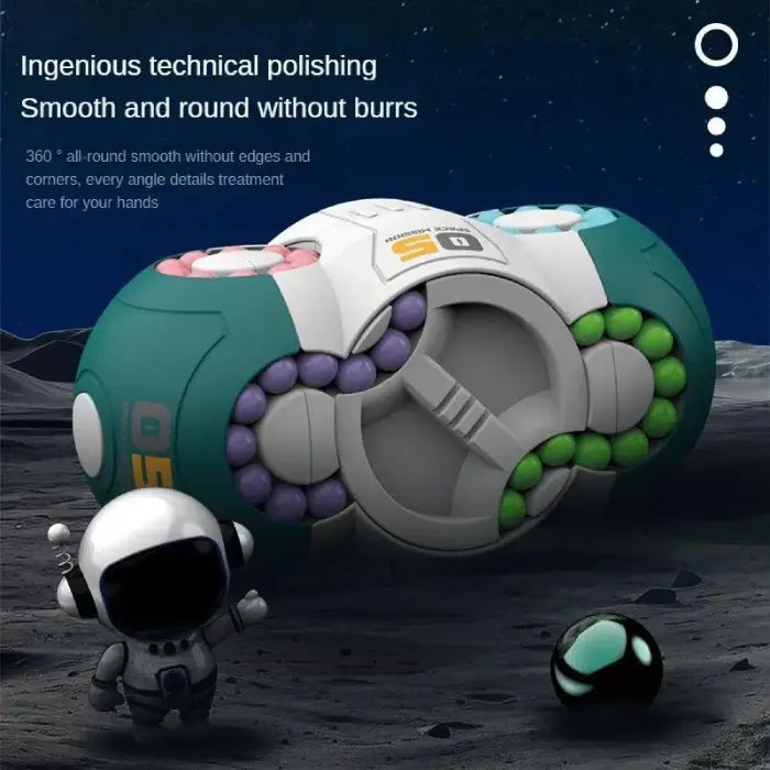 Fidget toy with smooth round edges and colorful beads on a lunar surface with space-themed decor.