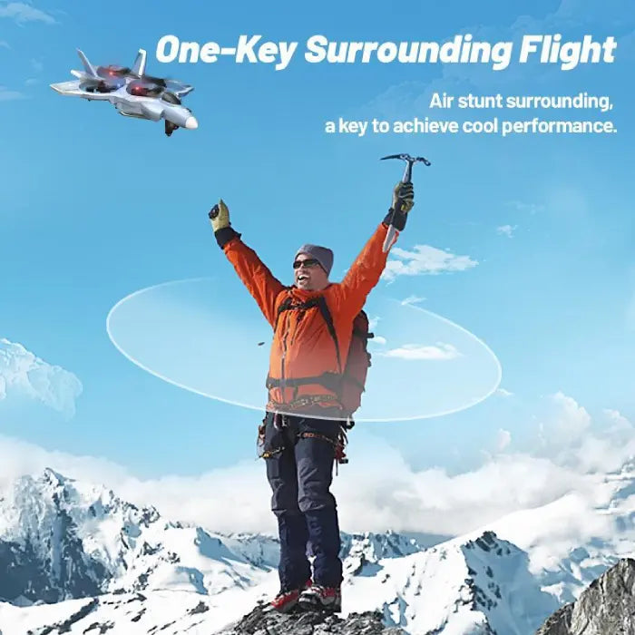 Fighter jet drone in air performing one-key surround flight over hiker on snowy mountain peak.