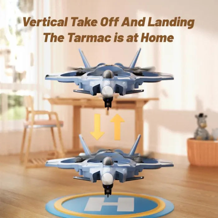 Fighter jet drone hovering indoors showing vertical takeoff and landing with directional arrows.