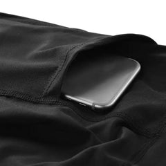 fitness leggings women stretch close-up of side pocket holding a smartphone