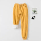  "Fleece jogger yellow women drawstring pants with pockets and white lining for cold weather"