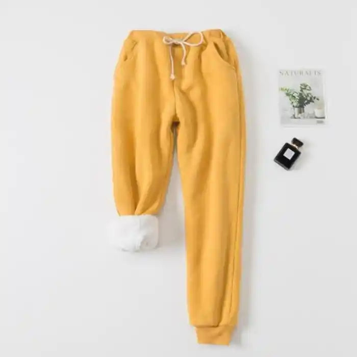  "Fleece jogger yellow women drawstring pants with pockets and white lining for cold weather"