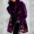 Floral Embroidered Coat detail view highlighting purple wool fabric and floral embroidery for refined fashion appeal