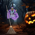 Flying witch yard decor midair with full moon and grinning pumpkin in eerie forest.