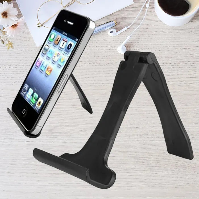 Foldable phone stand shown in use with a phone and separately empty, both placed on a desk setup.