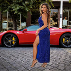 Formal dress in sparkling blue sequins paired with red Ferrari sports car on cobblestone street, combining elegance with luxury.