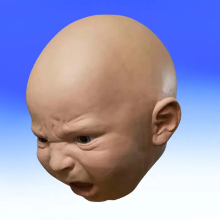 Funny baby mask showing intense angry expression viewed from the side with exaggerated frown lines.