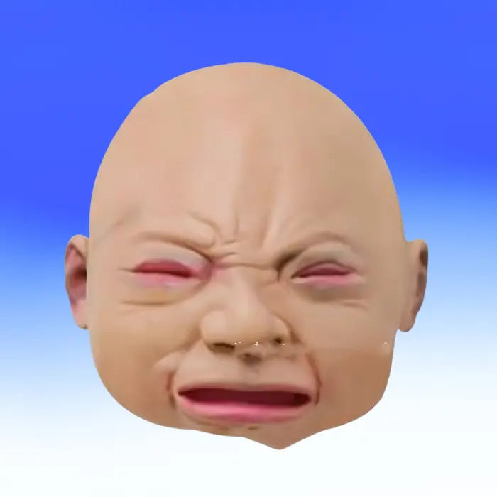 Closeup of funny baby mask with scrunched crying face, closed pink eyes and exaggerated lips.