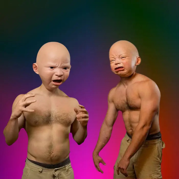 Two shirtless adults wearing funny baby masks with angry and crying faces posed against dark background.