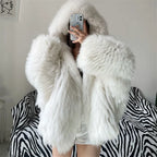 white fur hooded coat with premium fluffy faux fur texture, oversized shape and clean winter aesthetic for a stylish cozy look