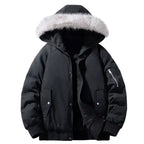 Fur hooded puffer bomber jacket in black with zip pockets, white faux fur trim, and cozy ribbed hem for winter