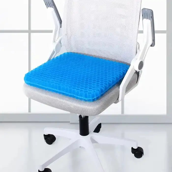 Gel seat cushion on office chair featuring honeycomb structure for cooling and ergonomic sitting comfort.
