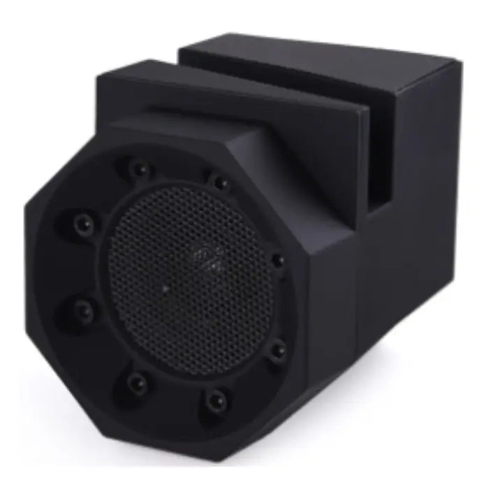 Close-up of black geometric wireless speaker with octagonal shape and visible speaker grille