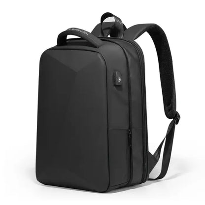 Black laptop backpack with angular geometric design, padded straps, and side USB port for charging devices on-the-go