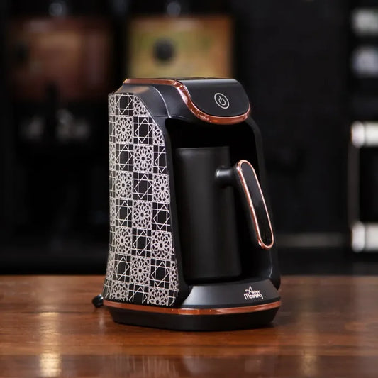 Modern Turkish Electric coffee maker with traditional geometric patterns on wooden surface