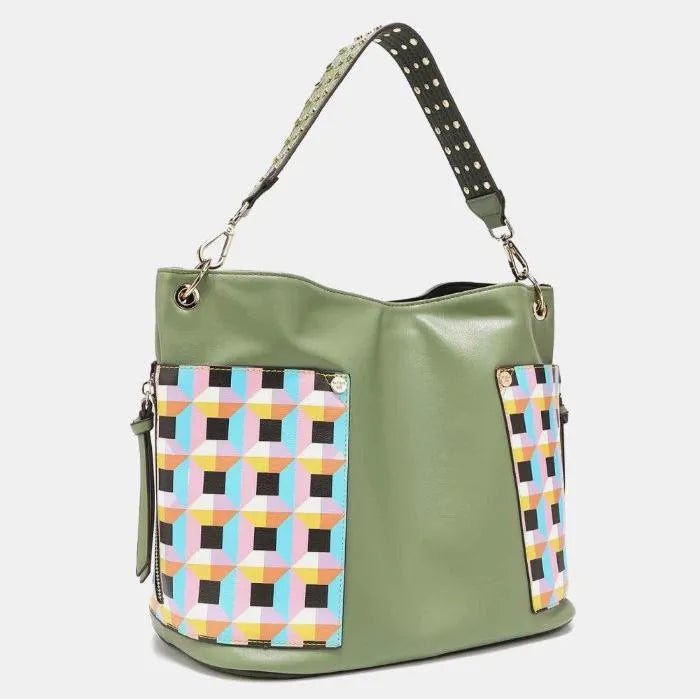 Modern hobo-style bag in sage leather with colorful geometric print side panels and silver hardware details