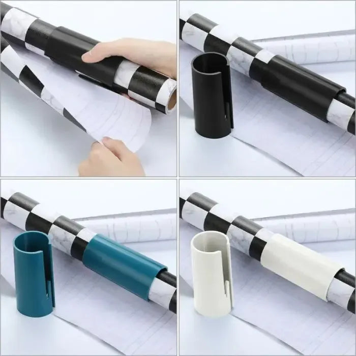 Gift wrap cutter in black, teal, and white colors shown on different rolls of wrapping paper.