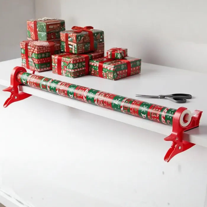 Gift wrapping clamps holding long festive wrapping roll on table, enabling smooth cutting and fast holiday present preparation.