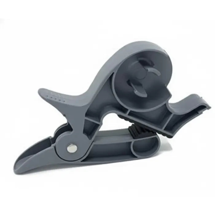 Gift wrapping clamps in minimalist gray design shown ready for tape loading, supporting smoother, faster paper-wrapping workflow.