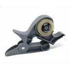 Gift wrapping clamps in gray with tape installed, providing secure grip and easy paper cutting for efficient holiday gift prep.