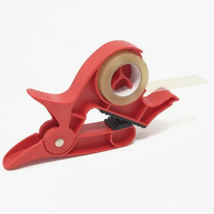 Gift wrapping clamps with tape roll installed, offering smooth tape dispensing and secure paper handling for fast wrapping tasks.