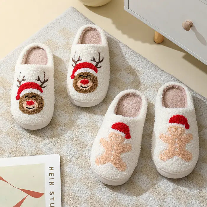 Holiday slippers with gingerbread man and reindeer designs for festive comfort.