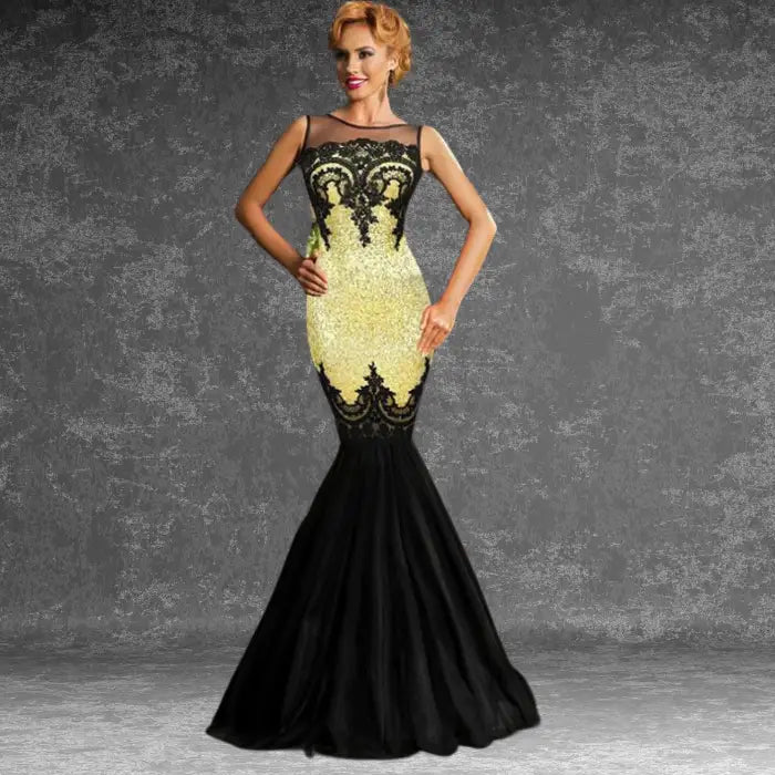 Woman posing confidently in a glamorous gold and black sequin mermaid dress featuring intricate lace accents for sale