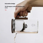  Glass Teapot with One-Click Magnetic Tea Infuser being tilted at 90 degrees without lid falling