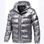 Glossy quilted puffer jacket with hood in metallic silver, featuring zip front, elastic cuffs, and ribbed waistband.