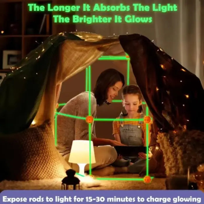 Illuminated fort building structure demonstrating glow-in-dark features with charging instructions for STEM learning playtime
