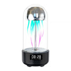 Illuminated jellyfish-shaped light in glass dome with digital clock display and speaker base