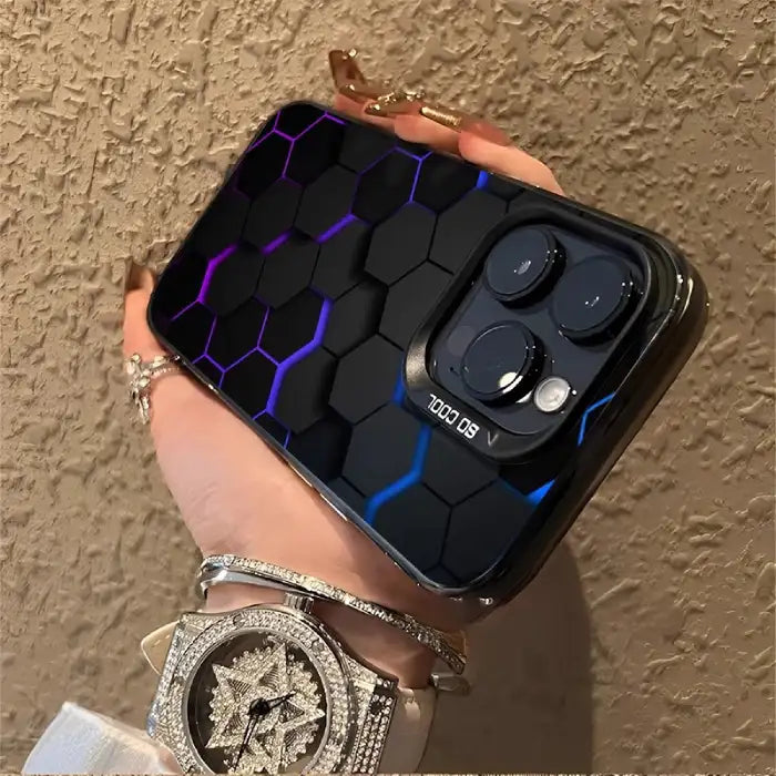 glowing protective iPhone case featuring black hexagonal pattern with purple-blue illuminated edges held in hand with jewelry accessories