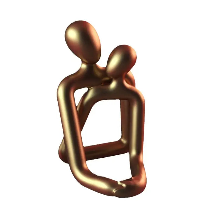 Gold abstract figure sculpture with modern design, perfect for contemporary home or office decoration.