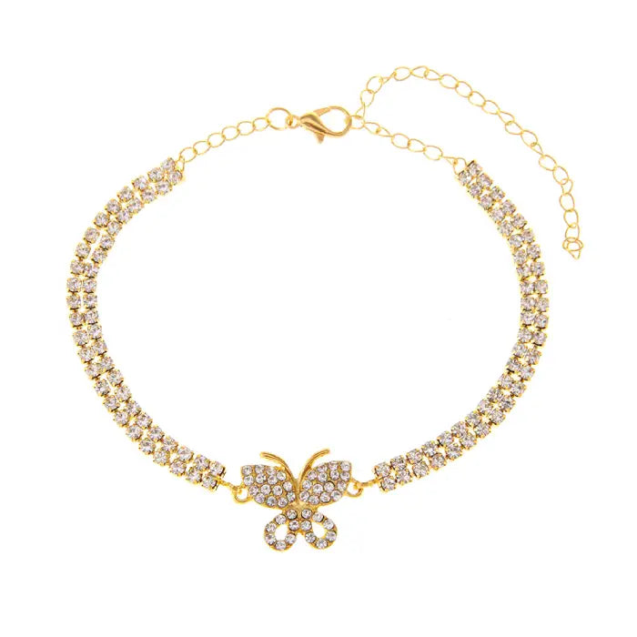 Gold butterfly chain anklet with sparkling crystals and adjustable clasp displayed on a white background.