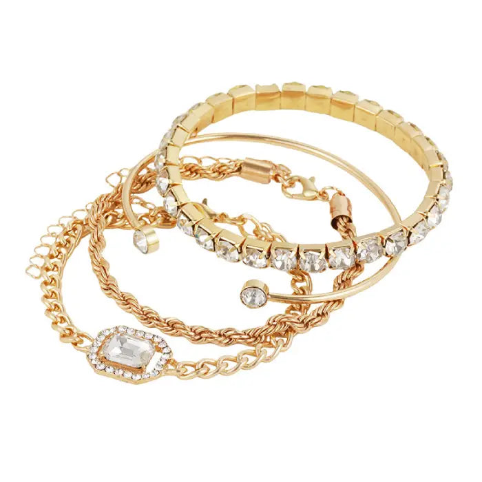 Gold bracelet set with crystal details, showcasing elegant chains and shimmering accents for women.
