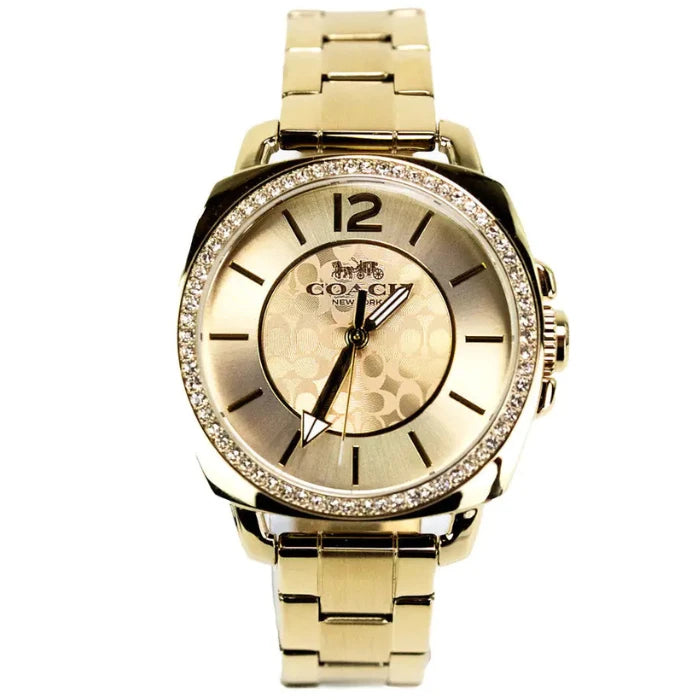 Luxury gold-tone watch with crystal bezel, champagne dial, and metallic bracelet