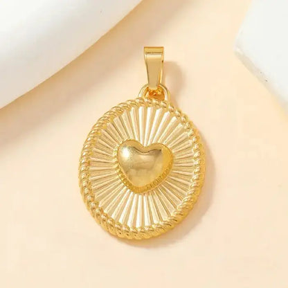 Gold heart-shaped pendant with a radiant textured circular frame, great for romantic and unique jewelry.