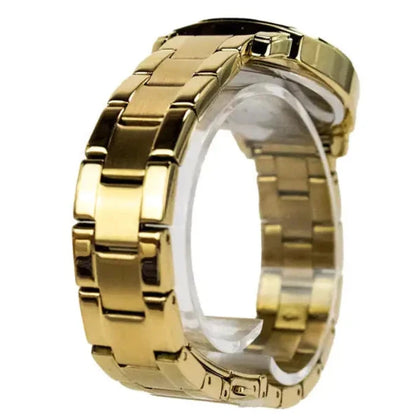 Detailed view of polished gold-tone metal watch bracelet links