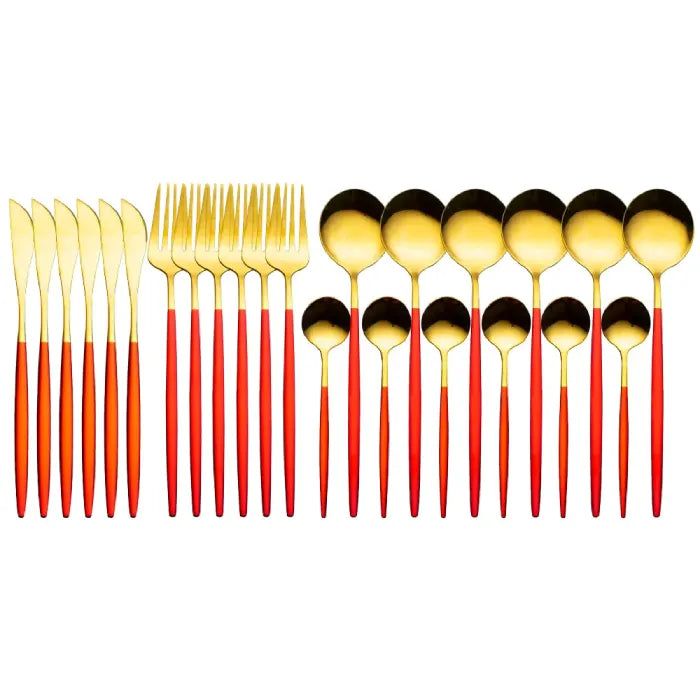 Modern dining set with gold heads and red handles including knives, forks and spoons