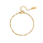 Gold rope chain bracelet with adjustable clasp, a versatile piece for everyday jewelry styling.