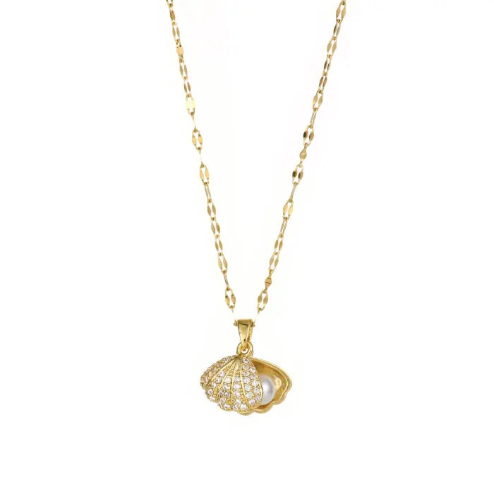 gold seashell necklace with open crystal shell pendant and pearl displayed on clean white background