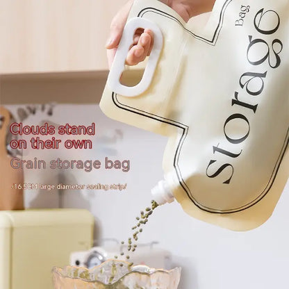 Grain storage bag with large opening spout and ergonomic handle for convenient kitchen dispensing.