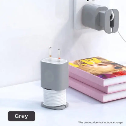 Gray cable organizer for chargers, featuring a neat coiled cord design for easy cable management.