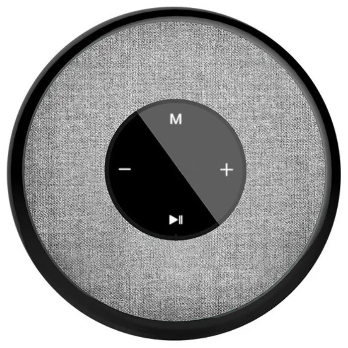 Circular smart speaker with gray fabric cover and black control panel featuring volume, play/pause, and mode buttons